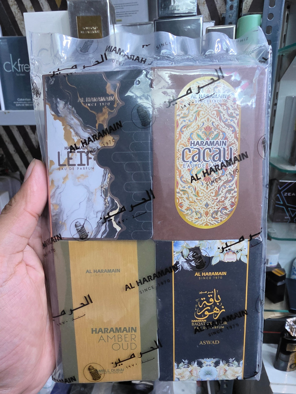 Sealed Al Haramain 4-fragrance vial discovery set with Leif, Cacau, Amber Oud Smell Dubai and Baqat Zuhoor Aswad