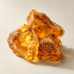 Warm resin forms representing the amber fragrance accord