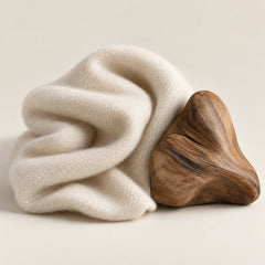 Conceptual soft fabric and wood representing the Cashmeran fragrance note