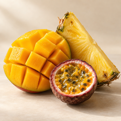Representative a compact still life of a ripe mango half, pineapple wedge and passionfruit half, rich natural textures imagery for fragrance-note discovery