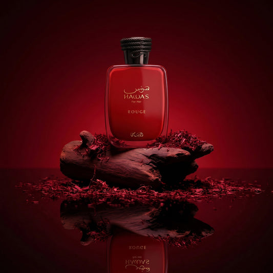 Official Rasasi Hawas Rouge fragrance luxury campaign with red bottle